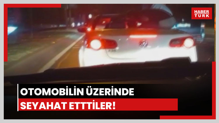 Otomobilin üstünde seyahat ettiler
