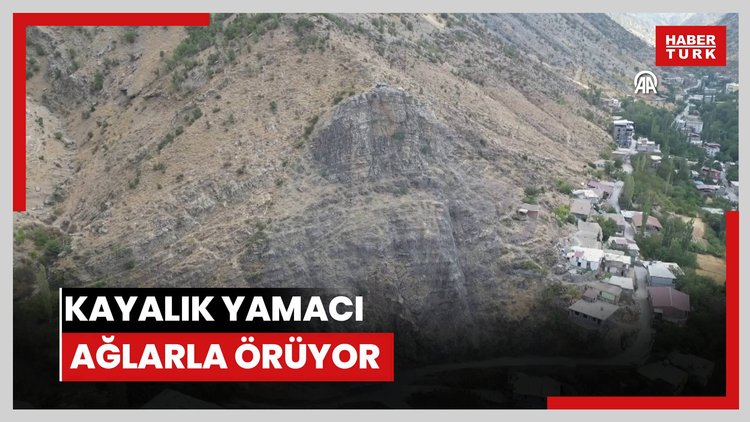 AFAD, Şırnakta mahalle sakinlerini korumak için kayalık yamacı çelik ağlarla örüyor