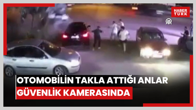 Otomobilin yaya ve araçların üzerinden savrularak takla attığı anlar güvenlik kamerasında
