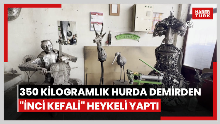 İran'lı heykeltıraş 350 kilogramlık hurda demirden "inci kefali" heykeli yaptı