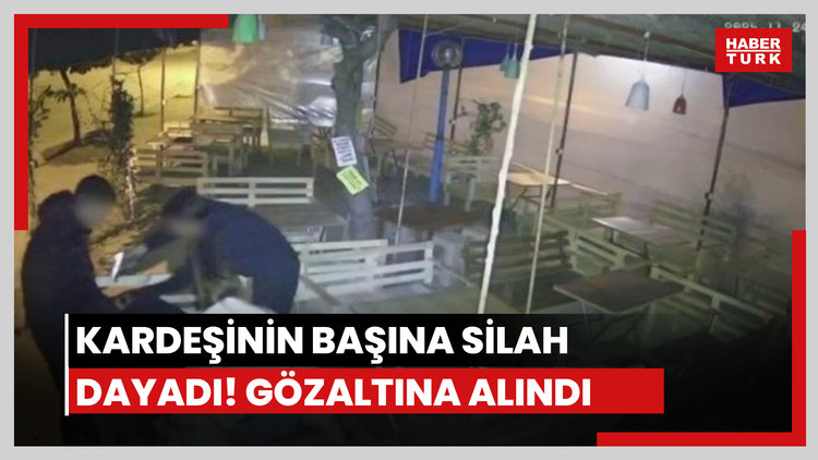 Kardeşinin başına silah dayadı