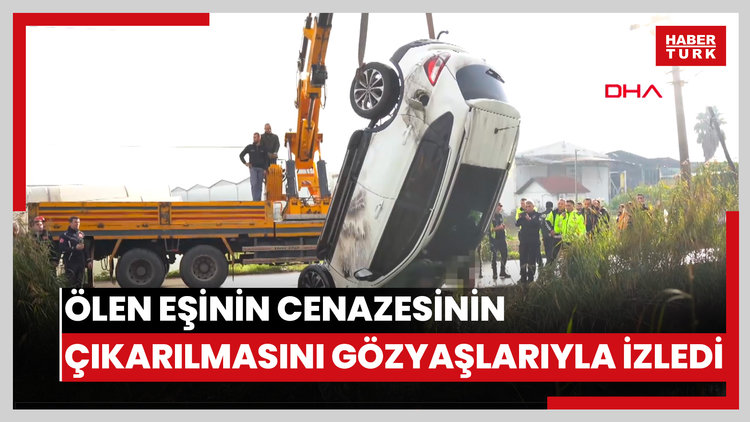 Kanala uçan cipte ölen eşinin cenazesinin çıkarılmasını gözyaşlarıyla izledi