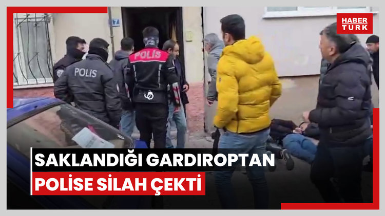 Saklandığı gardıroptan polise silah çekti!