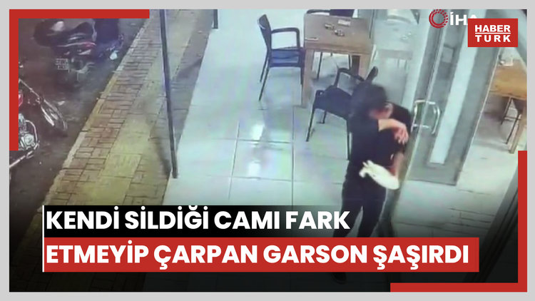 Kendi sildiği camı fark etmeyip yüzünü çarpan garson neye uğradığını şaşırdı