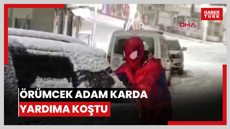 Karda mahsur kalan sürücünün yardımına 'Örümcek Adam' yetişti