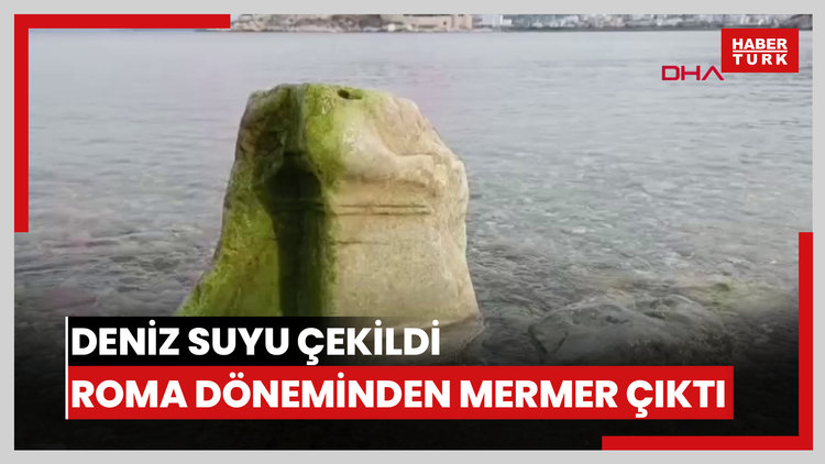 Kuşadası'nda deniz suyu çekildi; Roma dönemine ait mermer kaide ortaya çıktı