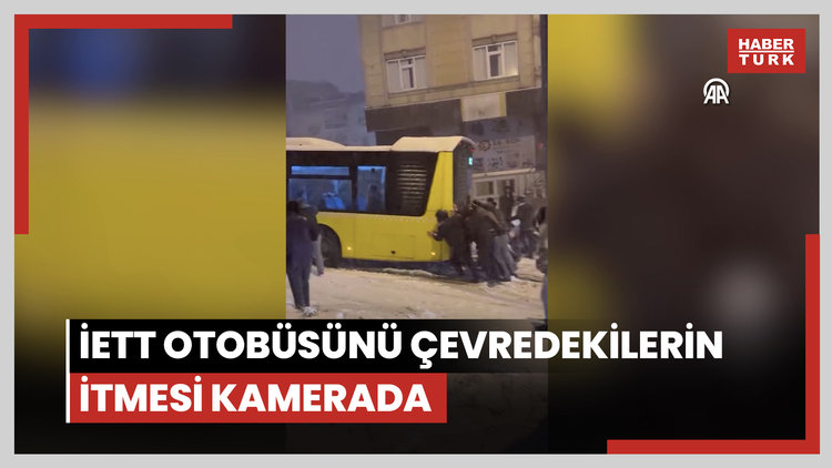 Esenler'de kar nedeniyle yokuşu çıkamayan İETT otobüsünü çevredekilerin itmesi kamerada