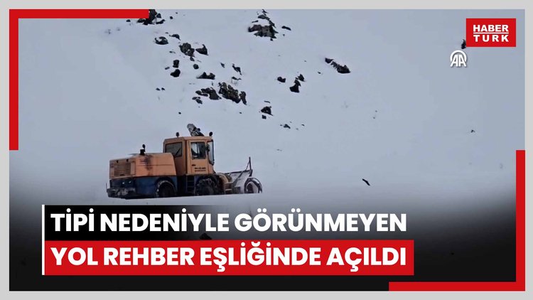 Iğdırda kardan kapanan ve tipi nedeniyle görünmeyen yol rehber eşliğinde açıldı