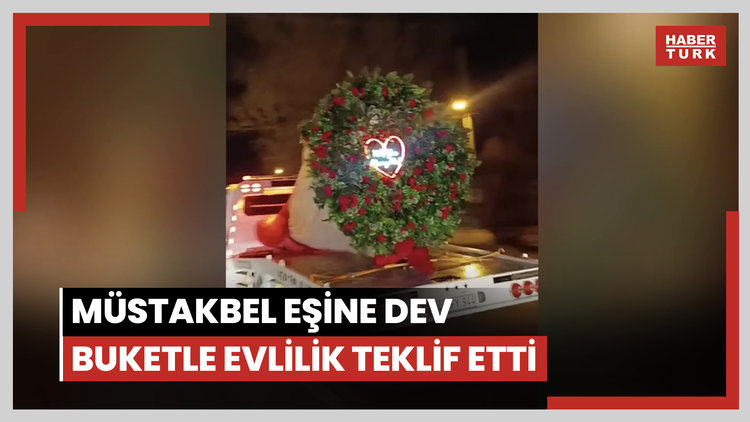 Müstakbel eşine oto kurtarıcıyla taşınan dev buketle evlilik teklif etti