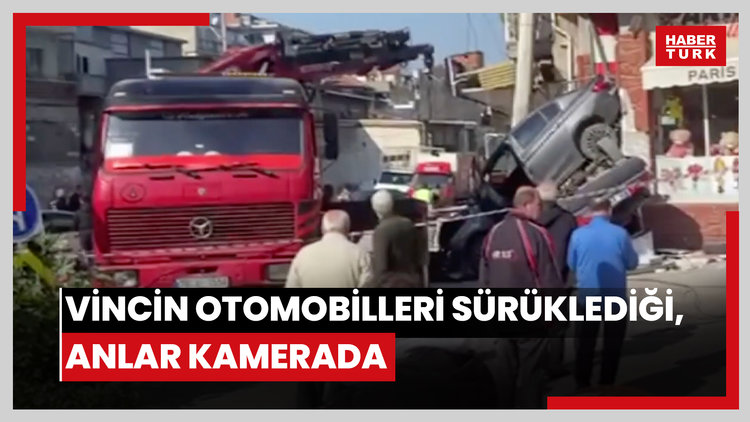 Kontrolden çıkan vincin otomobilleri sürüklediği anlar kamerada