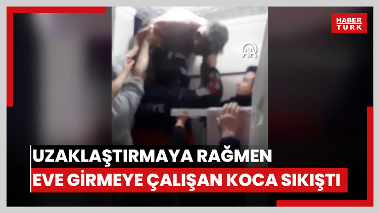 Uzaklaştırma kararına rağmen eşinin evine girmek isteyen koca havalandırma boşluğunda sıkıştı