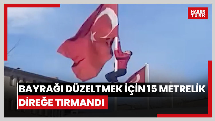 Rüzgarda dolanan bayrağı düzeltmek için 15 metrelik direğe tırmandı; o anlar görüntülendi