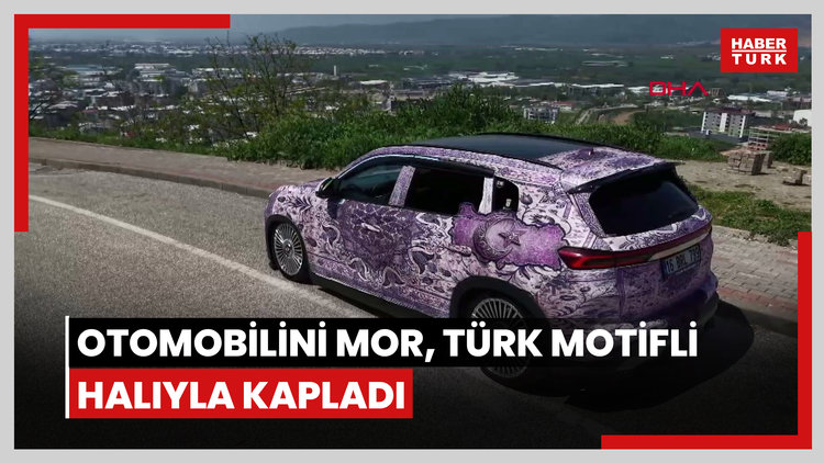 Otomobilini Türk motiflerinin yer aldığı mor renkli halıyla kapladı