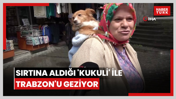 Battaniyeye sarıp sırtına aldığı 'Kukuli' ile Trabzon'u geziyor