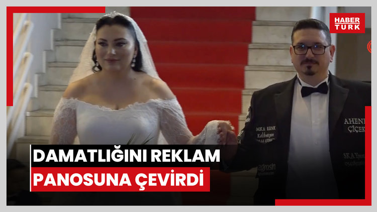 Düğün masrafını düşürmek için damatlığını reklam panosuna çevirdi