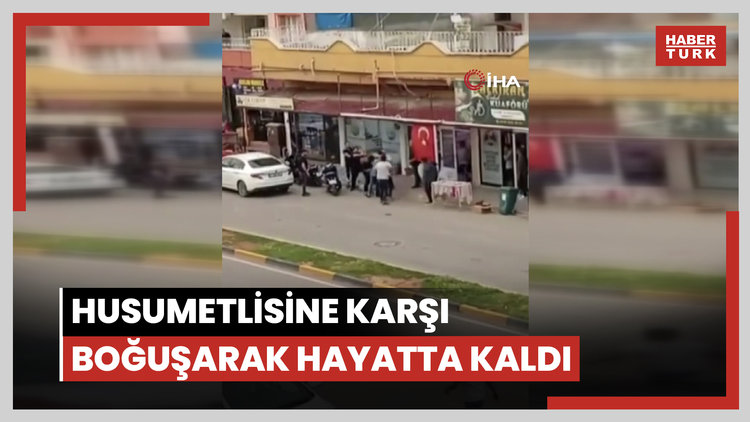 Silahla döviz bürosunu basan husumetlisine karşı boğuşarak hayatta kalmayı başardı...O anlar kamerada