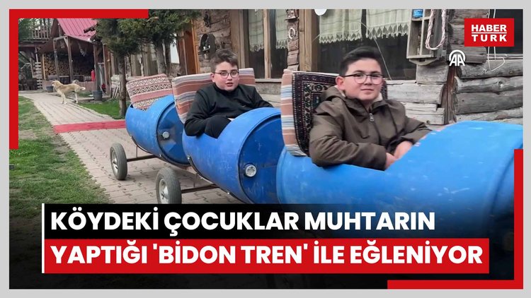 Köydeki çocuklar muhtarın yaptığı 'bidon tren' ile eğleniyor