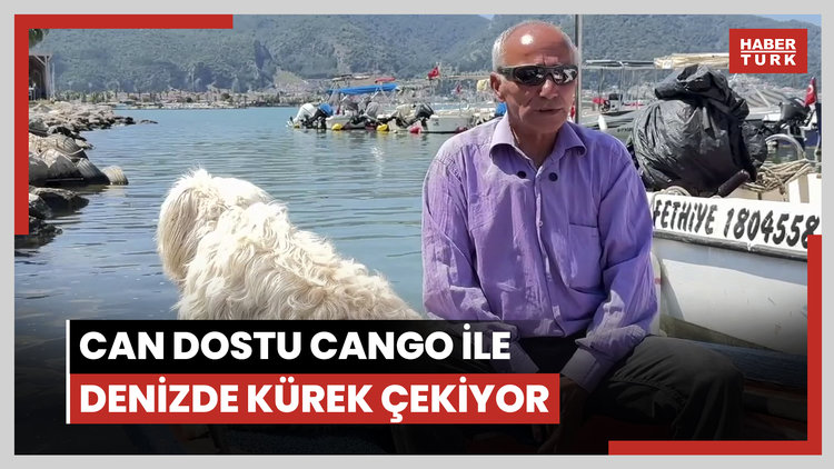 Can dostu Cango ile denizde kürek çekiyor
