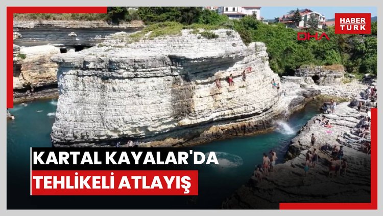 Adrenalin tutkunlarının Kartal Kayalar'da tehlikeli atlayışı