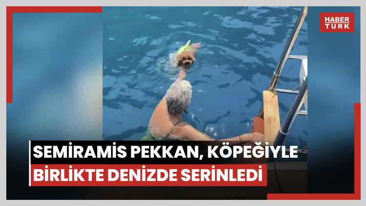 Semiramis Pekkan, köpeğiyle birlikte denizde serinledi