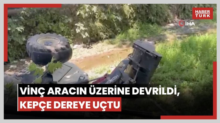 Vinç aracın üzerine devrildi, kepçe dereye uçtu: Korku dolu anlar kamerada