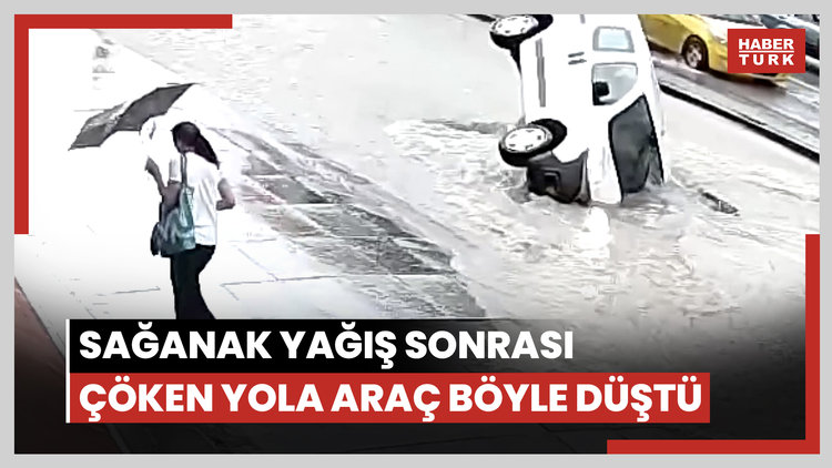 Sağanak yağış sonrası çöken yola araç böyle düştü
