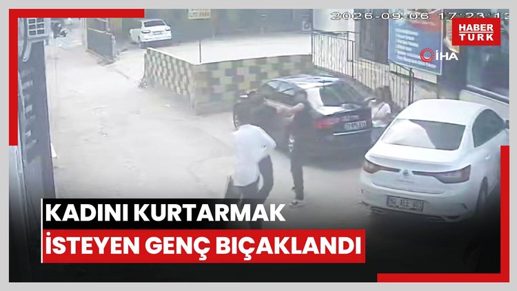 Darbedilen kadını kurtarmak isteyen gencin bıçaklı saldırıya uğradığı anlar kamerada