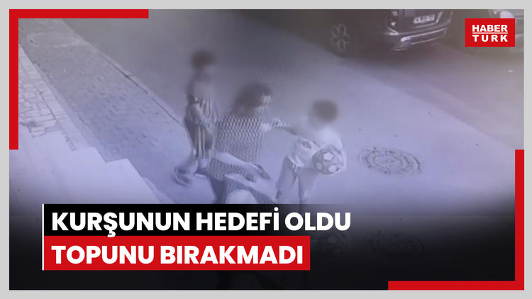 Kurşunun hedefi oldu, topunu bırakmadı