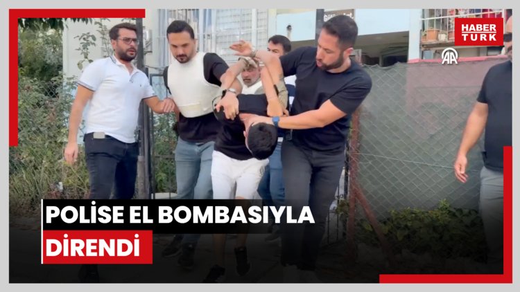 Polise el bombasıyla direndi